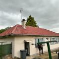 réalisation d'une toiture en tuiles pannes bisch nuagé et gouttieres en zinc